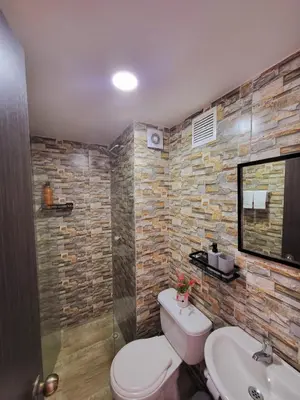 a bathroom with a toilet and a sink at Departamento con vista al mar in Cartagena de Indias