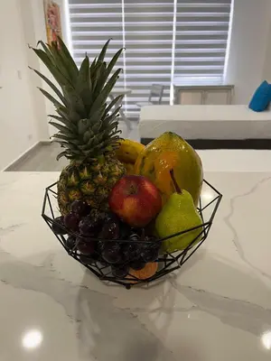 a bowl of fruit sitting on a counter at Apt luxury wifi AC pool at Cartagena in Cartagena de Indias