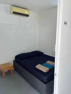 a bed in a room with a blue mattress at Habitación cerca a la playa 205 in Cartagena de Indias