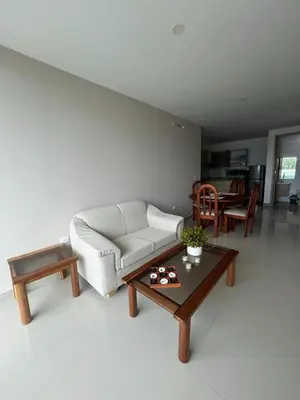a living room with a couch and a coffee table at Apto Caribe Mar in Coveñas