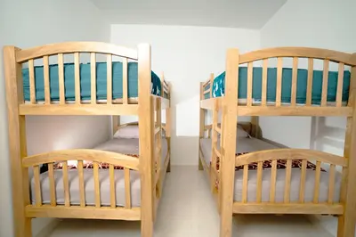 two bunk beds sitting next to each other in a room at Casa Murillo Toro in Cartagena de Indias