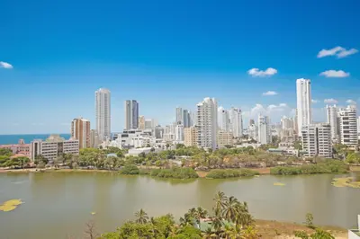 a view of a city with a river and buildings at Riviera del Mar - Apartamento con vista panorámica al mar in Cartagena de Indias