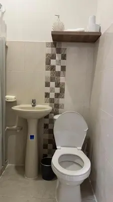 a bathroom with a toilet and a sink at aparta estudio susheria in Sincelejo