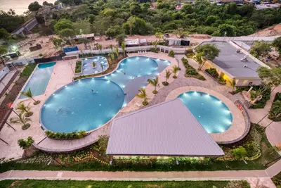 an overhead view of a swimming pool at a resort at Maranta Beach in Santa Marta