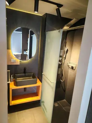 a bathroom with a sink and a mirror at Exclusive apartment Cartagena in Cartagena de Indias