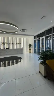 a lobby of a building with a large room with plants at Exclusive apartment Cartagena in Cartagena de Indias