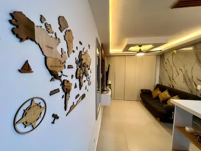 a wall with a map of the world on it at Apto Luxury Cartagena 7 minutos a pie de la playa in Cartagena de Indias
