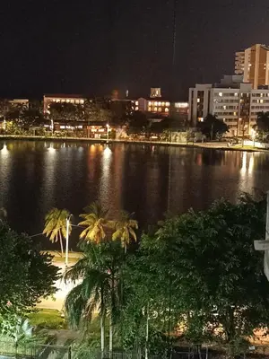 a view of a large body of water at night at Atardeceres del Laguito in Cartagena de Indias