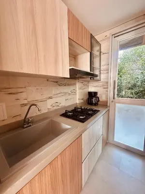 a kitchen with a sink and a stove at Fotosíntesis - Apartamento frente al mar en Tolú in San Silvestre