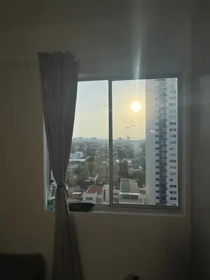 a window with a view of a city at Great and affordable in Cartagena de Indias