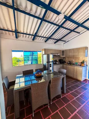 a kitchen with a table and chairs in a room at Liz&Mar in El Morro