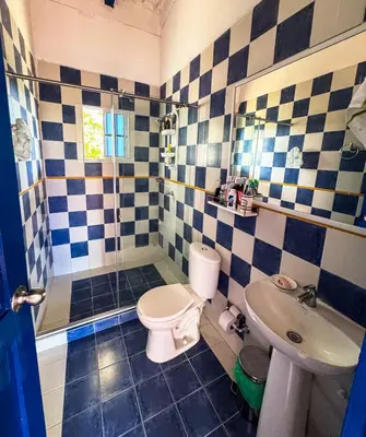 a bathroom with a toilet and a sink at Liz&Mar in El Morro