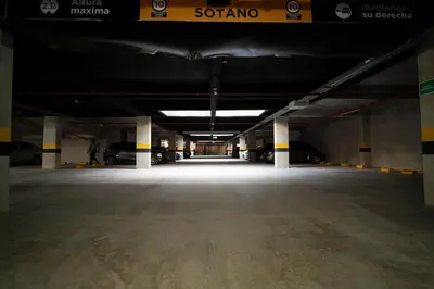 an empty parking garage with cars parked in it at Refugio costero, Serena del Mar - Cartagena Indias in Serena del Mar