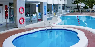 a pool in a building with two swimming pools at Vive 801 in Cartagena de Indias