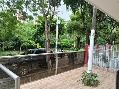a car parked on a balcony with a fence at Dilla House in Cartagena de Indias