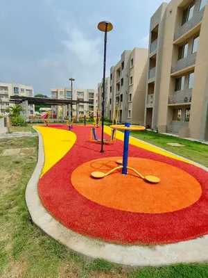 a playground with a red yellow and red carpet at Encantador Apartamento en Serena del Mar in Manzanillo del Mar