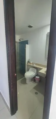a bathroom with a toilet and a shower in it at Lodging Apto 37 Palmetto Eliptic in Cartagena de Indias