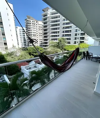a hammock on the balcony of a building at Fantástico apartamento 505 in Cartagena de Indias