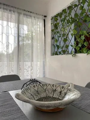 a bowl sitting on a table in front of a window at Acogedor apartamento excelente ubicación in Barranquilla