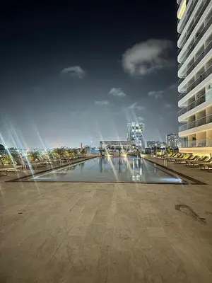 a fountain in the middle of a city with buildings at Suite con Vista al Mar en Cartagena 1106CB in Cartagena de Indias