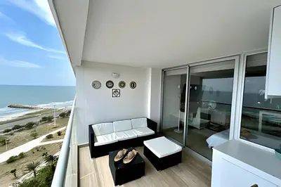 a room with a view of the ocean at Suite con Vista al Mar en Cartagena 1106CB in Cartagena de Indias