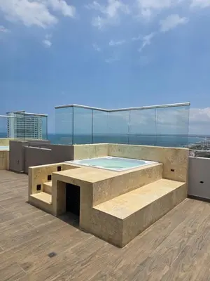 a pool on the roof of a building at brisa y sol - sunset 47 in Cartagena de Indias