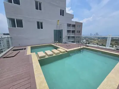a swimming pool on the roof of a building at brisa y sol - sunset 47 in Cartagena de Indias