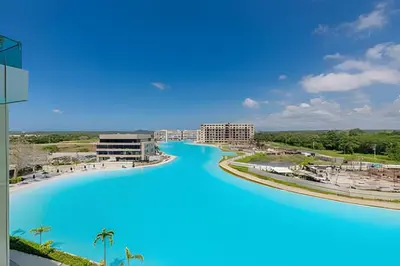 arial view of the pool at the resort at Espectacular vista a laguna de Kristal / 1 alcoba in Los Arrayanes