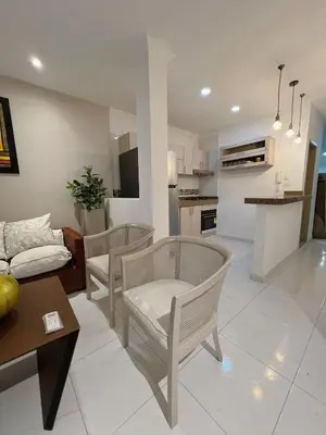 a living room with a couch and chairs and a table at New house in Barranquilla in Barranquilla