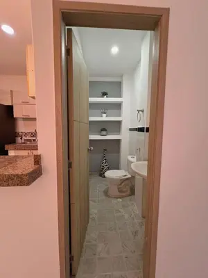 a bathroom with a toilet and a sink at New house in Barranquilla in Barranquilla