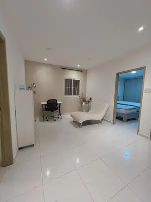 a large white room with a couch and a table at New house in Barranquilla in Barranquilla