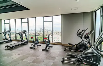a gym with a bunch of exercise bikes in a room at Modern Sunset Stay Cartagena in Cartagena de Indias