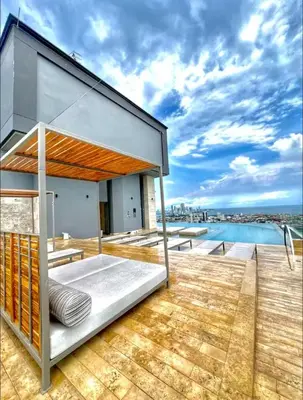 a house on a roof with a bed on a deck at Modern Sunset Stay Cartagena in Cartagena de Indias