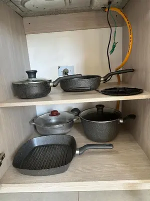 a kitchen with pots and pans on shelves at 302 Apartamento frente al mar in San Bernardo del Viento