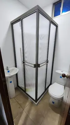 a bathroom with a toilet and a sink at Cabaña brisa de mar in San Silvestre