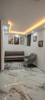 a living room with a couch and a chair at Apto Hermoso Samu in Barranquilla