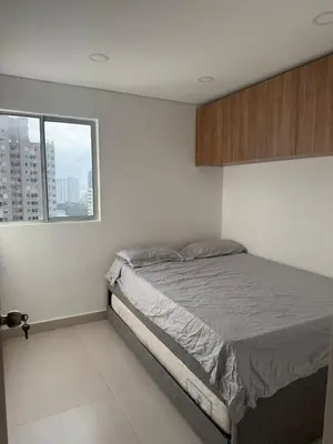a bedroom with a bed and a window at Cartagena Mood ON in Cartagena de Indias