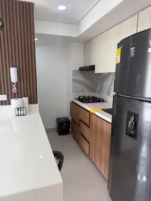 a kitchen with a stainless steel refrigerator and a stove at Cartagena Mood ON in Cartagena de Indias