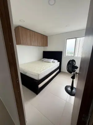 a bedroom with a bed and a camera in it at Cartagena Mood ON in Cartagena de Indias