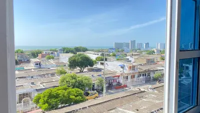 a view from a window of a city with a train at Apartamentos las palmas in Cartagena de Indias