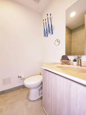 a bathroom with a toilet and a sink at VILLA LILI Santa Marina Santa Marta in Santa Marta