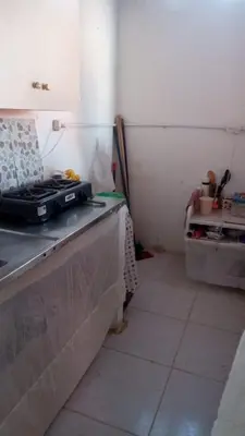 a kitchen with a counter top in a room at Refugio olgamar, Cabaña con kiosco cerca al mar in Moñitos