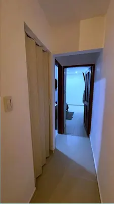 a room with a hallway with a view of the ocean at Escapate a Tolú - Lindo Apartamento in Santiago