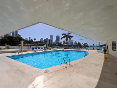 a swimming pool with a view of the city at Cartagena Beach con vista al mar in Cartagena de Indias