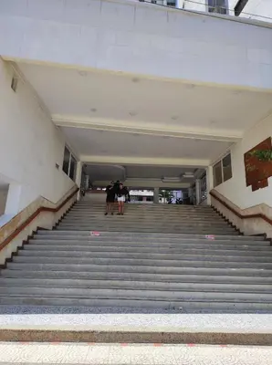 a group of people standing on the stairs of a building at Cartagena Beach con vista al mar in Cartagena de Indias