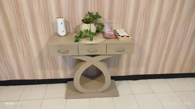 a small table with a phone on top of it at casa perla del mar in Cartagena de Indias