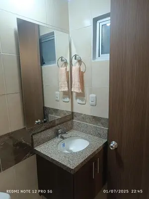 a bathroom with a sink and a mirror at Lajoya in Barranquilla