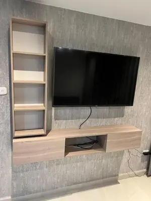 a flat screen tv sitting on a wall at Manglar - Ciudad Mallorquin in Puerto Colombia