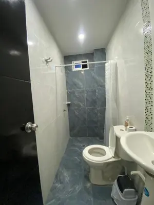 a bathroom with a toilet and a sink at Apartamento para Grupos En La Boquilla BBB in Cartagena de Indias