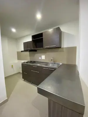 a kitchen with a stainless steel counter and a sink at Apartamento Para 6 Pax En La Boquilla VIAMAR in Cartagena de Indias